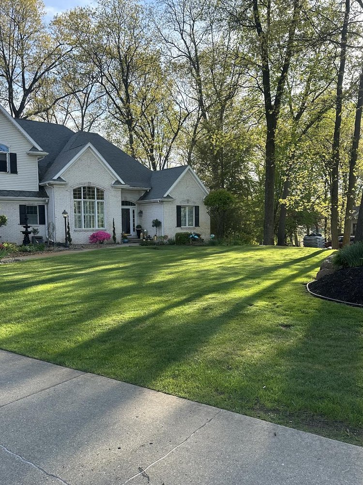 Freshly mowed residential lawn in South Bend, IN by Fernandez's Landscaping